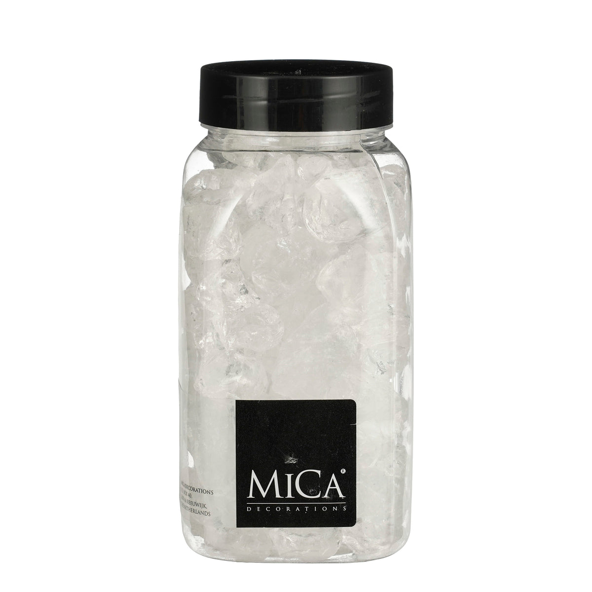 Behållare med genomskinliga dekorationsstenar i glas från Mica Decorations för hemdekoration och vinterlandskap