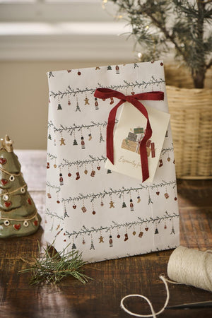Julklappspåse med bordeaux bomullsband och dekorativ rosett