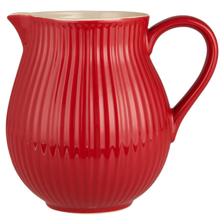 Jordgubbsröd Mynte-kanna från Ib Laursen i stengods med lodräta ränder och blank glasyr